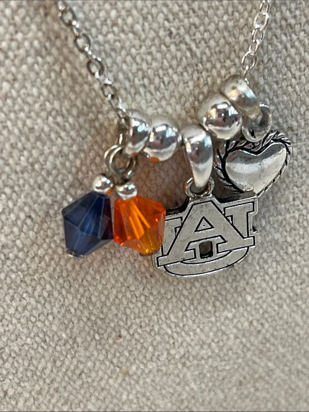 Auburn collegiate silver necklace with AU pendant in blue and orange